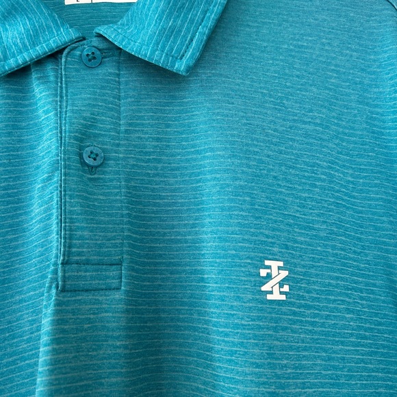 Izod Golf shirt; size L, aqua blue color with faint stripes. Good used condition - Picture 2 of 5
